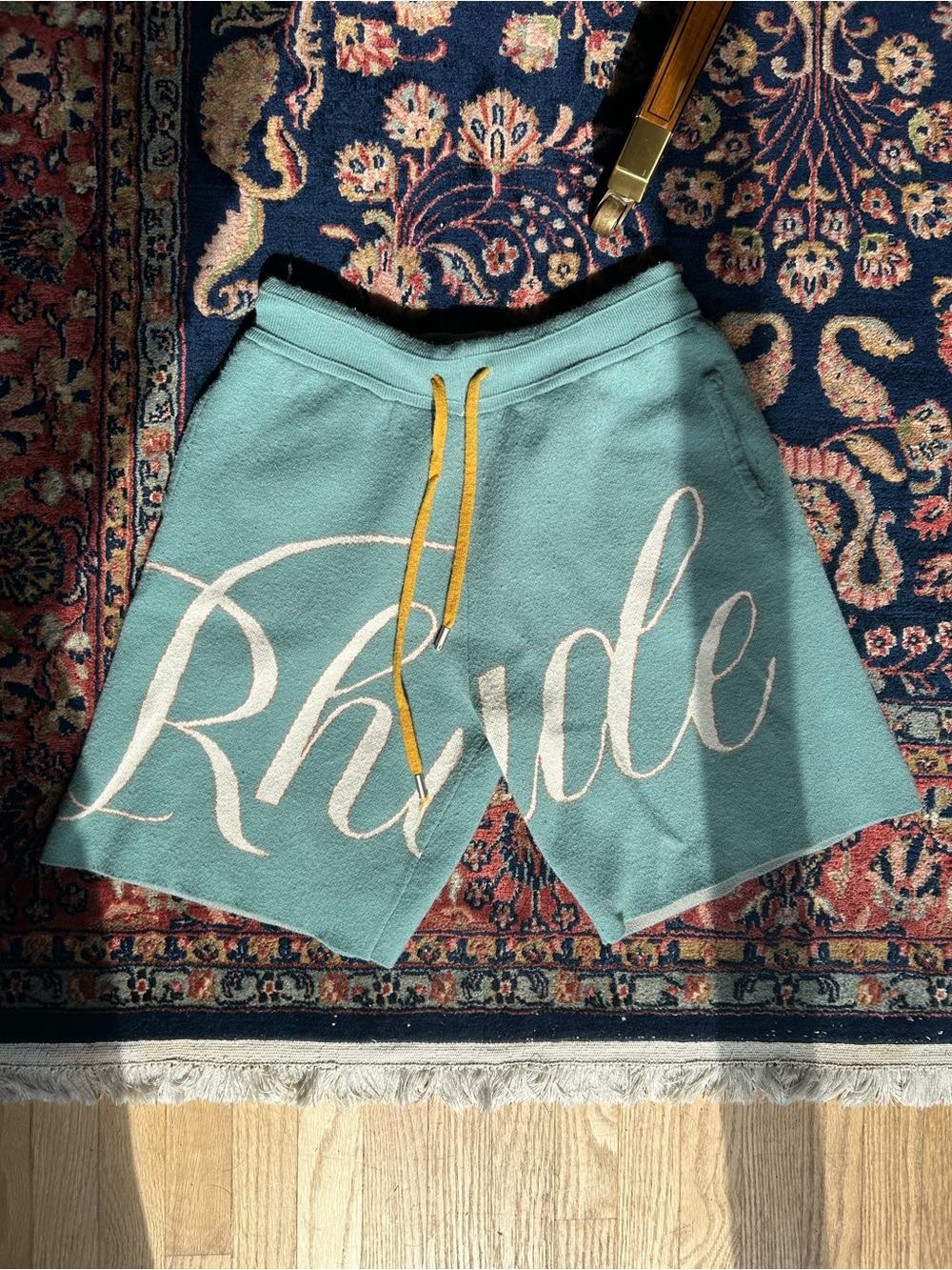Rhude Light Blue Script Knit Shorts with Yellow Drawstring